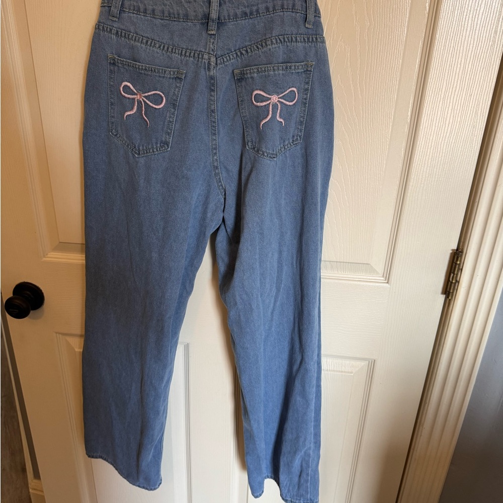 Wide Leg Jeans with Pink Bow Detail